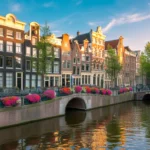 Charming view of Amsterdam's historic center with canals and traditional architecture.