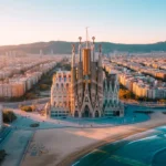 Aerial view of Barcelona highlighting Sagrada Familia and the beach.