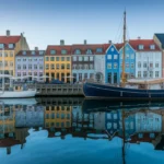 Colorful Nyhavn waterfront in Copenhagen reflecting on the water