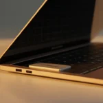 Close-up of a laptop highlighting the battery compartment for travel safety.